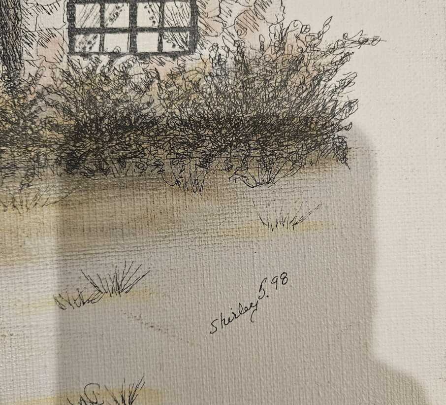 Close-up of the original house drawing and the signature 'Shirley S. 98'