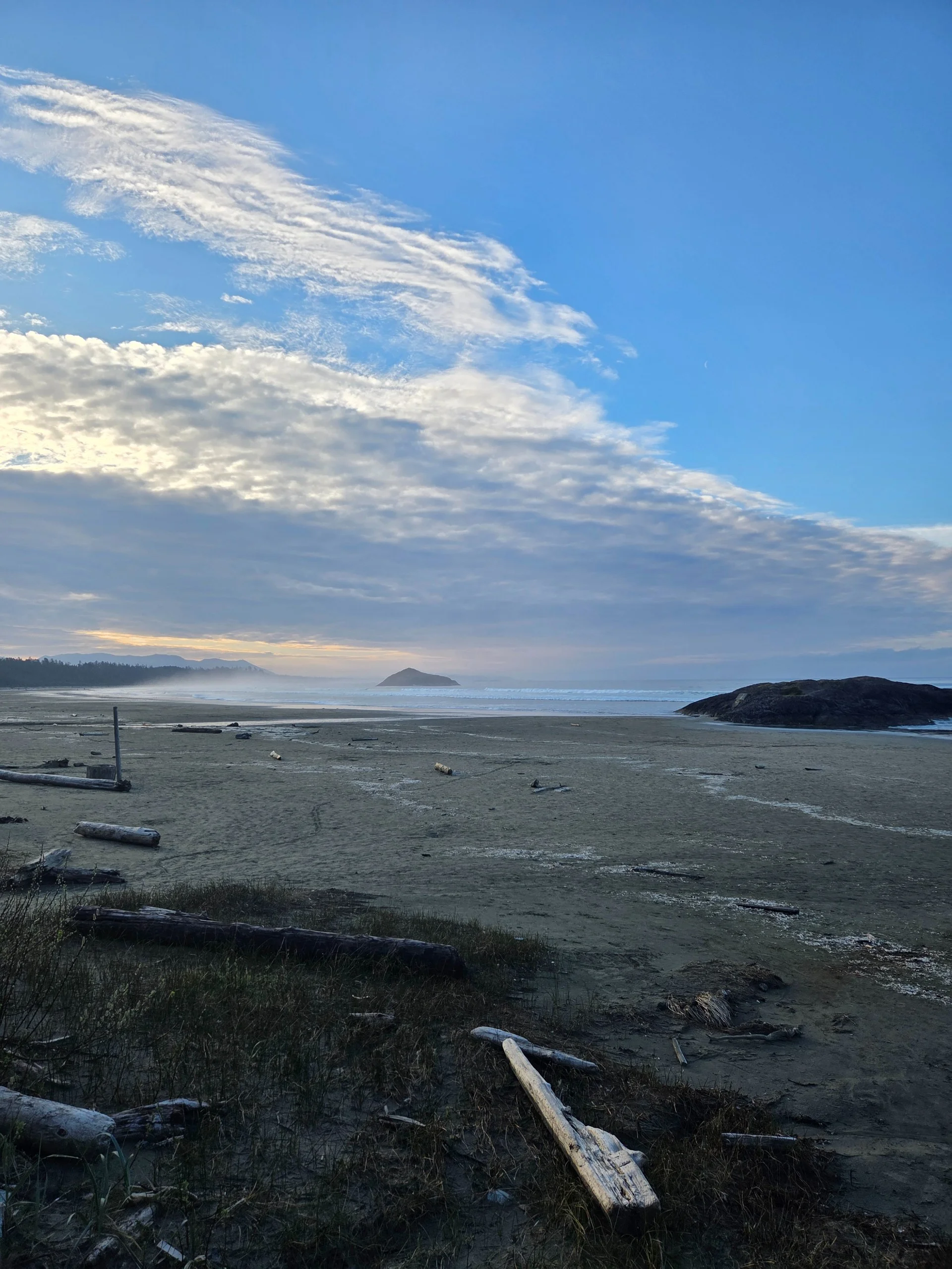 A quiet Pacific coastline at dusk on Vancouver Island